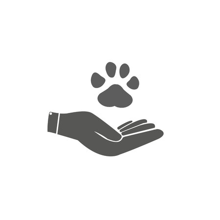 Hand holding paws - animal protection icon. Vector - Vectorのイラスト素材