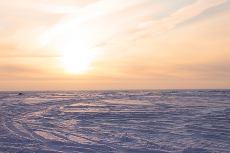 Beautiful winter sunset. Beautiful tints and reflection on to snow
