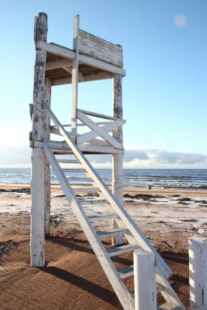White wooden tower on the beach of Gulf of Finland in St  Petersburg  Russiaの写真素材
