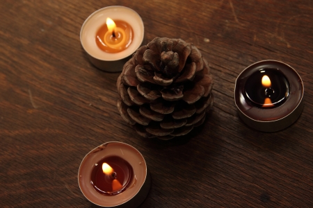 Three candles and bumb in brown tones  Cinnamon and appleの写真素材