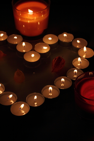 Heart of candles, a sign of love. romantic eveningの写真素材