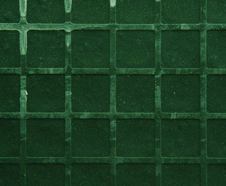 Seamless tileable grunge green square marble stone backgroundの写真素材