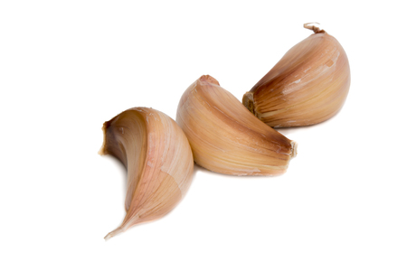 Isolated garlic. Raw garlic segment isolated on white background, with clipping pathの写真素材