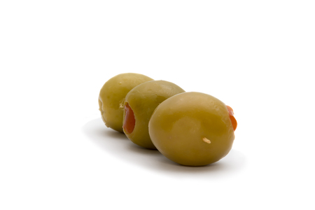 pickled olives isolated on white backgroundの写真素材
