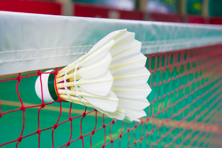Shuttlecock on net, badminton sportsの写真素材