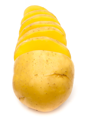 New potato cut isolated on white background close upの写真素材