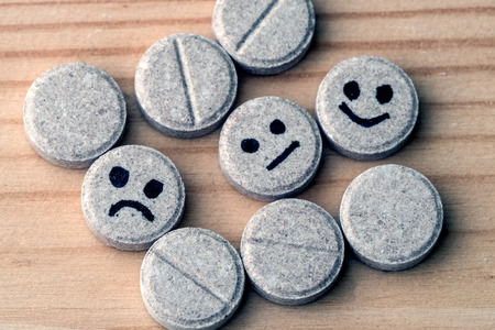 pills on wooden backgroundの写真素材