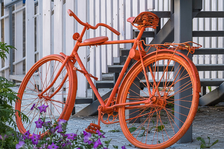 flowers and painted in orange color bikeの写真素材
