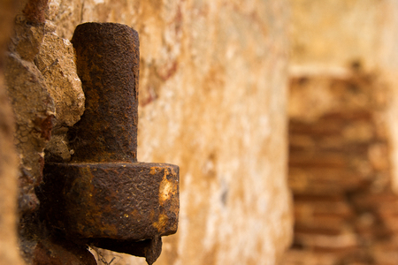 item old iron door in the ruined building in a ruined templeの写真素材