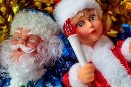 Grandfather frost and snow maiden with a toy in the hand of the snow maiden torch, Christmas moodの写真素材