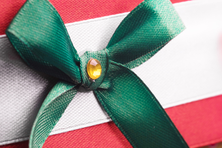 home-made needlework and homemade work, a bractic with a decorative green diamondの写真素材