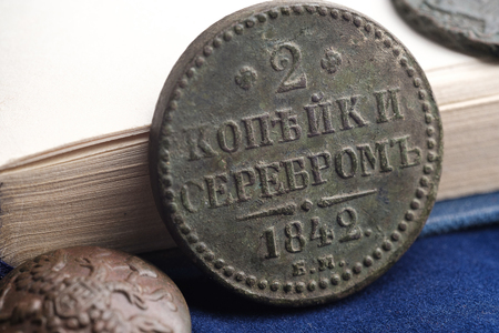 close-up 2 kopecks in silver 1842 Russia, old money from a bookの写真素材