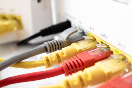 multi-colored copper cords patch for home internet connected to the router
