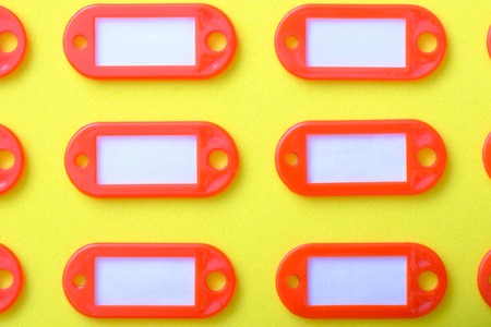 empty red tags for the keys to the apartment, a choice of many identicalの写真素材