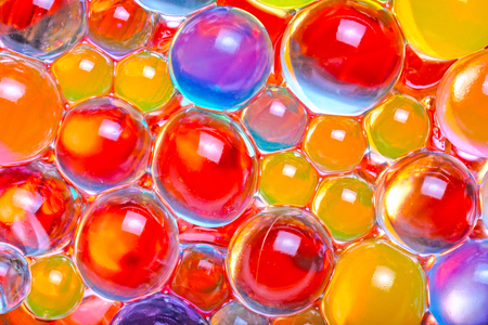 close-up of multi-colored hydrogel beads, a variety of colors and shapesの写真素材
