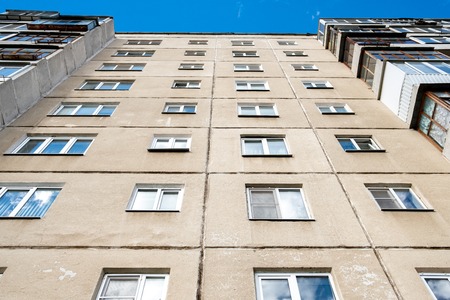 rising up the house is a multi-storey, old multi-storey building of the USSRの写真素材