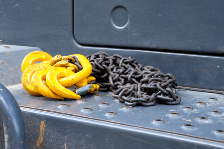 yellow hooks for lifting the load and chain on the mechanism, metal hooks on the mechanismの写真素材