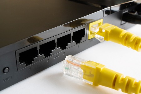 one cable is inserted into the router the second lies next to the router, disconnected from the home...