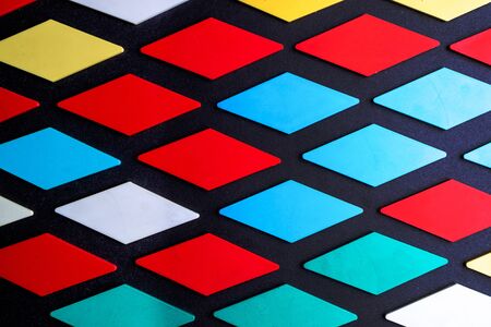 Abstract background of geometric shapes of different colors laid horizontallyの写真素材
