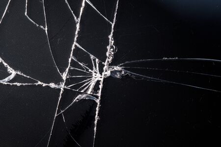 cracked smartphone screen close-up of broken glass