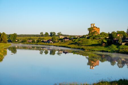 rural landscape of Central Russia river and dilapidated Church on the Bank. away from the hustle and...