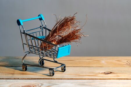 shiny copper wire in a supermarket trolley. non-ferrous metal purchaseの写真素材