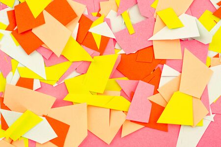 multicolored background from pieces of chopped paper. color paper texture and color