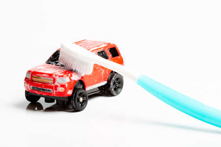 toy car red which can toothbrush, car wash gameの写真素材