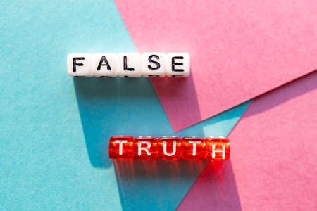 falsity and truth confrontation on the same surface, terms contradicting each other