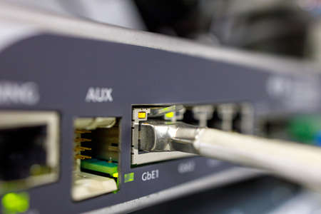 close-up of the server-side equipment at the provider, the patch cord is inserted into the switch