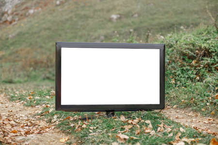 TV on the road with a blank screen for an inscription. mocap tv outdoorsの写真素材