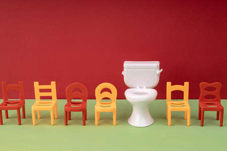 toilet in the same row with chairs, seats with amenities.の写真素材