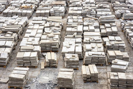 repair of the pavement, a lot of tiles stacked on top of each other. stacks of old pavement tilesの写真素材