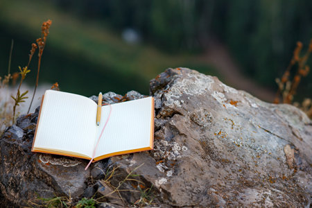 an open paper diary without notes. write down thoughts in nature in the old wayの写真素材