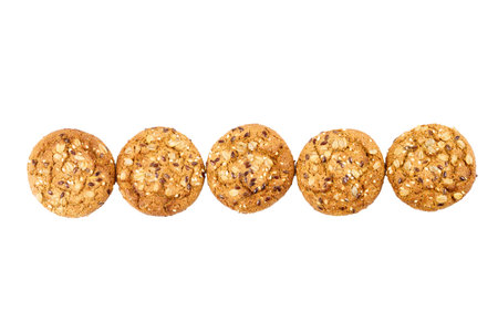 five round cookies are collected in a row. close-up on a white background