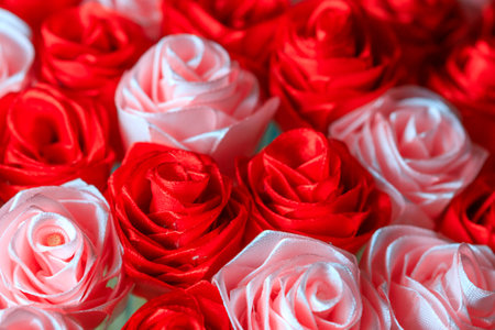 fake flowers made of ribbons. bouquet of decorative flowers