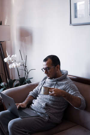 Young man working as home officeのeditorial素材