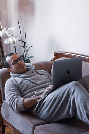 Young man working as home officeのeditorial素材