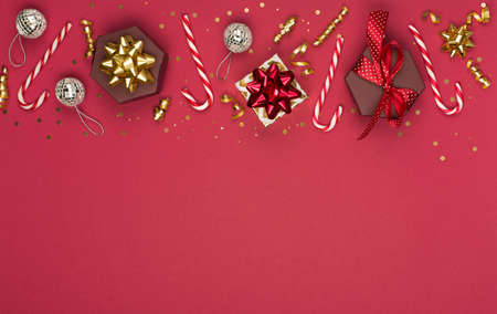 Christmas holiday greeting card template. Gold decorations, candy canes, festive gifts, mirror disco...