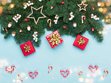 Christmas holiday winter New Year festive card. Xmas red gift boxes, candy canes, silver white...