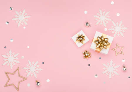 Christmas holiday greeting card template. Gold and silver decorations, festive gifts, snowflakes on...