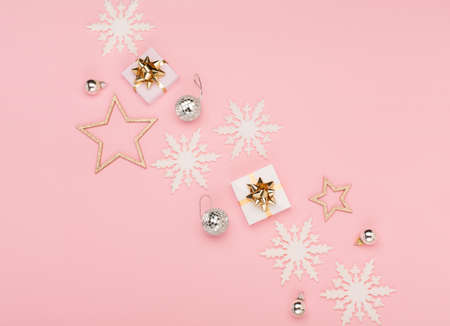 Christmas holiday greeting card template. Gold and silver decorations, festive gifts, snowflakes on...