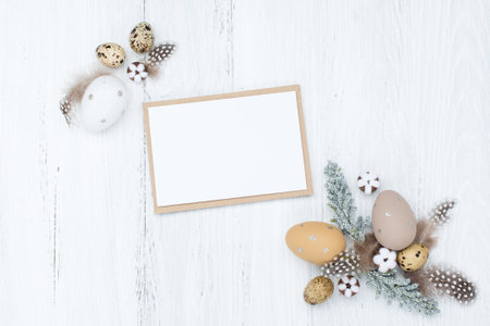 Craft Easter composition with Easter quail eggs in nest, pussy willow branches and cotton flowers on...