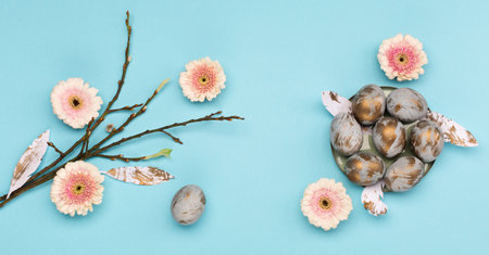 Festive Easter holiday greeting card, web banner. Easter Decoration with gray golden eggs, quail...