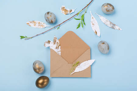Festive Easter holiday greeting card background. Easter Decoration with blue golden eggs, quail...