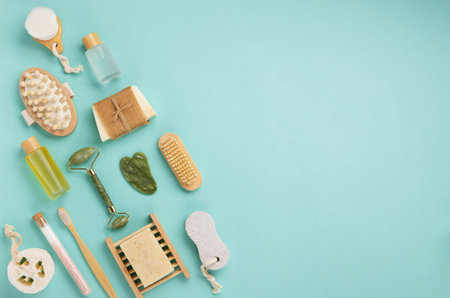 Natural eco friendly beauty natural skin care products concept. Zero waste bathroom and spa accessories on green mint background. handmade soap barsの写真素材