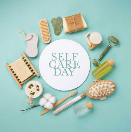 Happy Self Care Day. Natural eco friendly beauty skin care products concept. Zero waste bathroom and Organic spa accessories on green mint background. Handmade soap bars. concept of me timeの写真素材