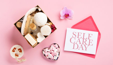 Happy Self Care Day. Natural eco friendly beauty skin care products concept. Zero waste bathroom and Organic spa accessories on pink background. Handmade soap bars. concept of me timeの写真素材