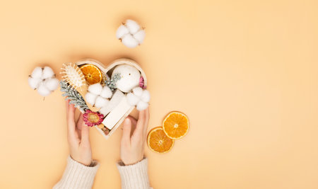 Happy Self Care Day. Natural eco friendly beauty skin care products concept. Zero waste bathroom and Organic spa accessories on orange pastel background. Handmade soap bars. concept of me timeの写真素材