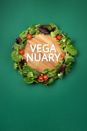 Vegetarian and vegan diet month in january called Veganuary. Variety of vegan, plant based protein food, healthy raw vegetables. Top view on green background.の写真素材